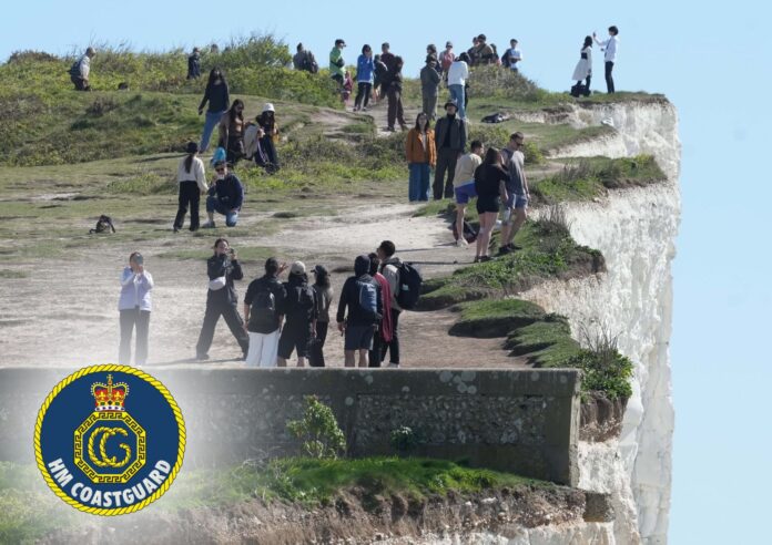 Tourists on dangerous cliff edge