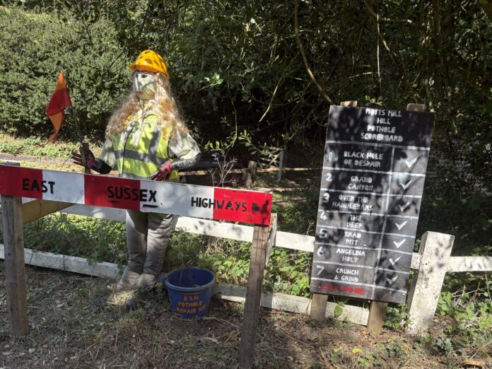 One of this year's Motts Mill scarecrows