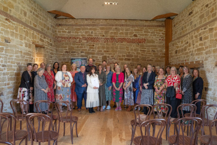Volunteers from Family2Family pictured with the Lord Lieutenant of East Sussex
